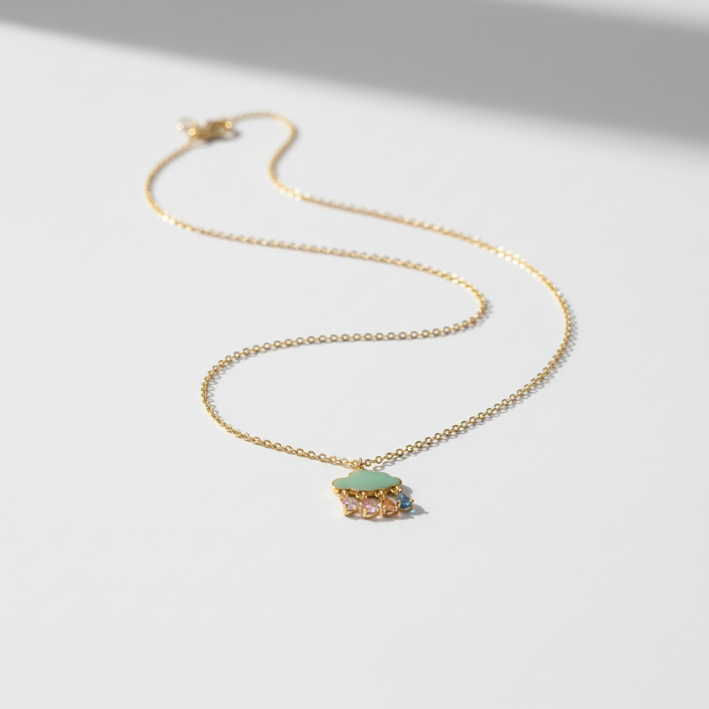 Cloud necklace on white surface