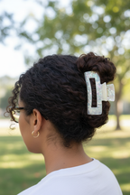 Coily hair high twisted bun