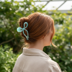 Copper red side view with mint blue bow