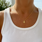 Cowboy boot necklace lifestyle - with white tee