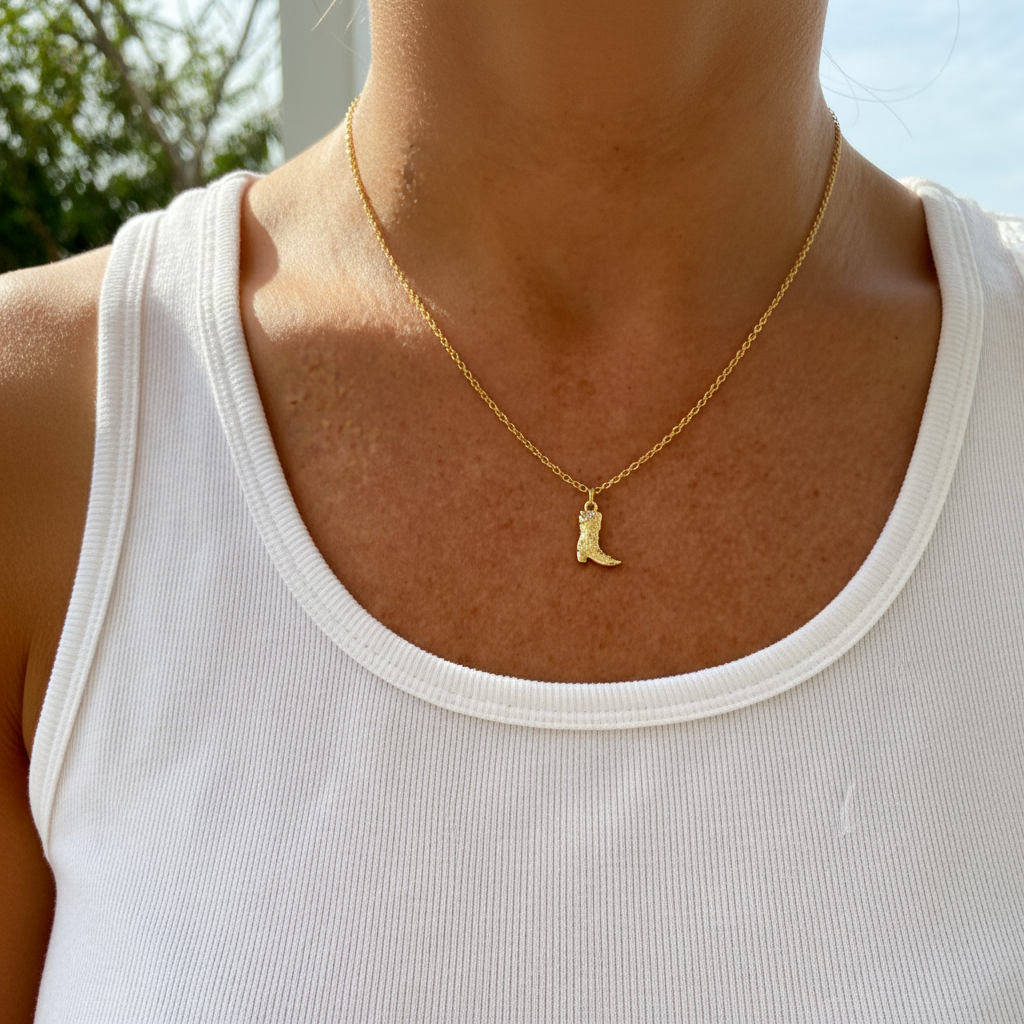 Cowboy boot necklace lifestyle - with white tee