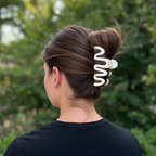Curly hair messy bun - back view