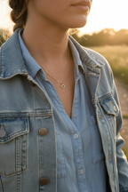 Evil eye necklace with denim jacket