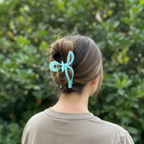 Honey brown highlights with mint blue bow clip