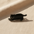 Black cat hair claw clip on cream linen