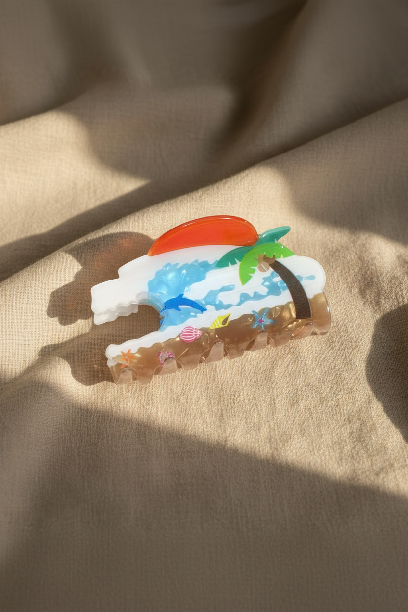 Beach scene hair clip on linen bedding