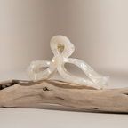 Champagne bow hair clip on driftwood display