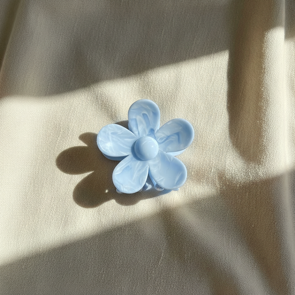 Blue flower clip on beige linen