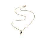 Minimalist flat lay of blue gemstone necklace on white background