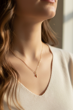 North star necklace below chin no face