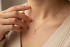 North star necklace hand touching pendant