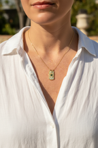 Person in white linen outdoors