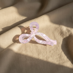 Pink bow overhead with shadows