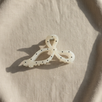Polka dot bow on oatmeal linen