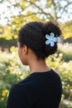 Textured coily natural hair with garden