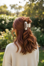 Wavy auburn with cream sweater